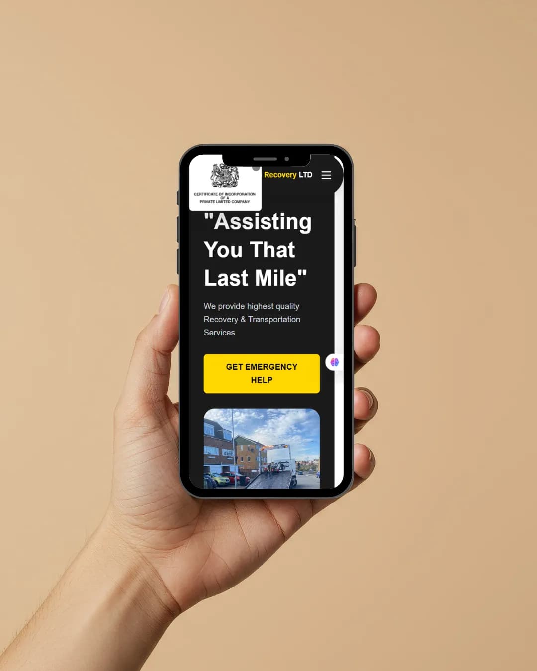 Last Mile Recovery website on a phone held in a hand